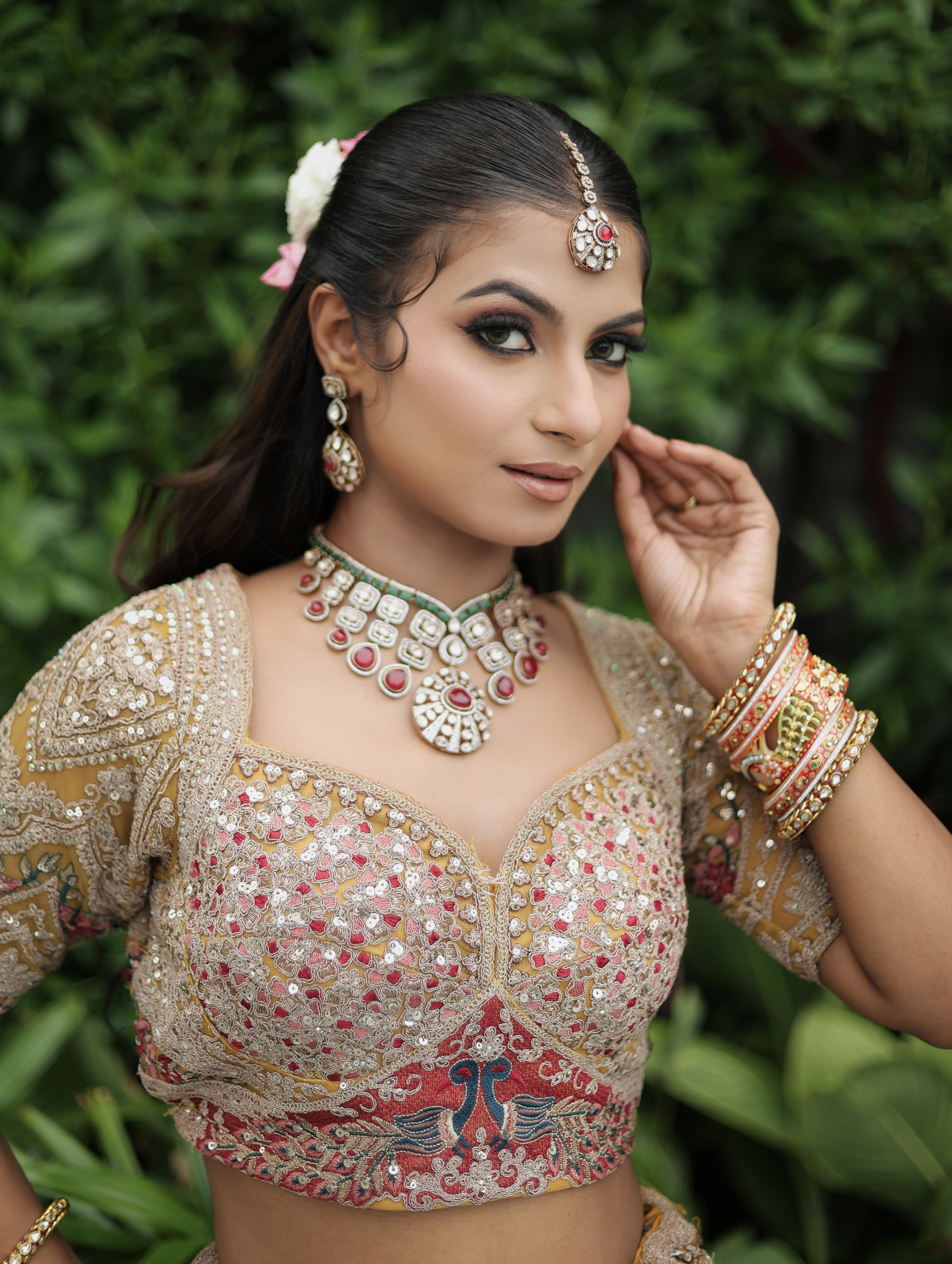 Macro close-up of bridal makeup showcasing flawless skin texture, rose eye glam and kundan jewelry